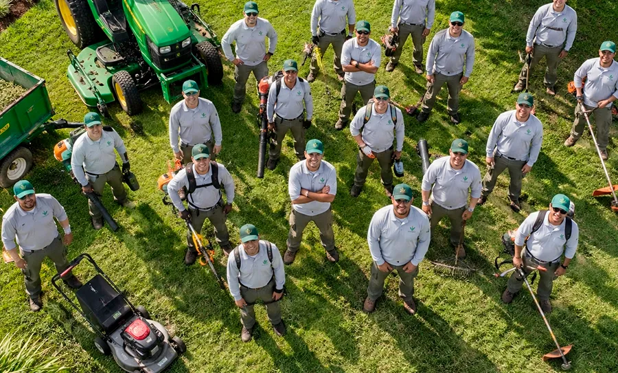 Equipo de personal de Turf Type con uniforme y maquinaria